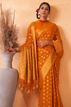 Admyrin Orange Georgette Zari Woven Design Saree with Blouse Piece
